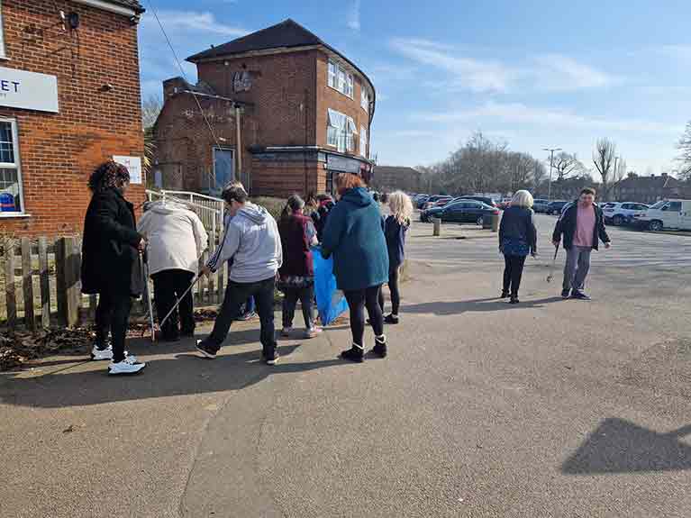 Colleagues and the people they support at Woodhall Community Centre spent
                            their Do Good Day picking up litter in their local area.