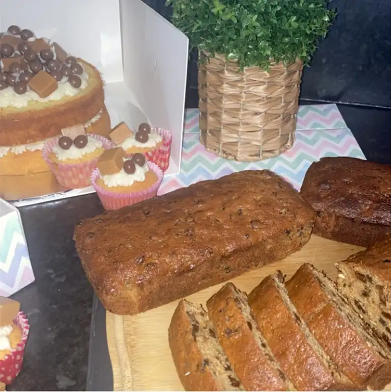 The team from St Raphael’s care home spent their day baking cakes and treats
                            for their local church.